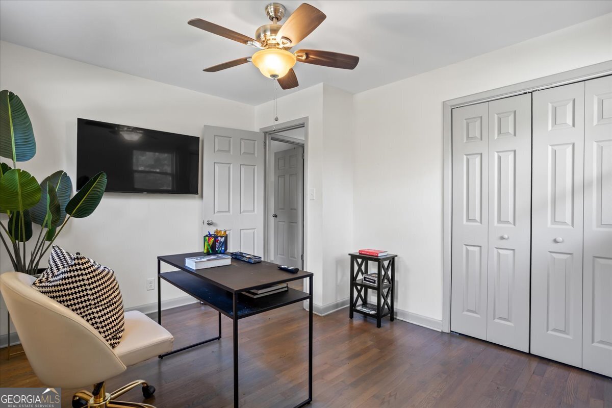 2316 Dorsey Avenue East Point, GA 30344 - Photo 22 of 25 a living room with furniture and a flat screen tv
