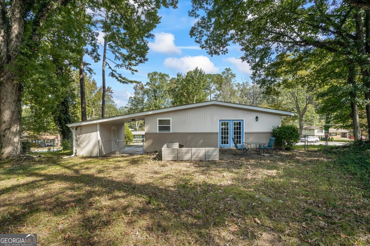 2316 Dorsey Avenue East Point, GA 30344 - Photo 4 of 25 a view of a house with a yard