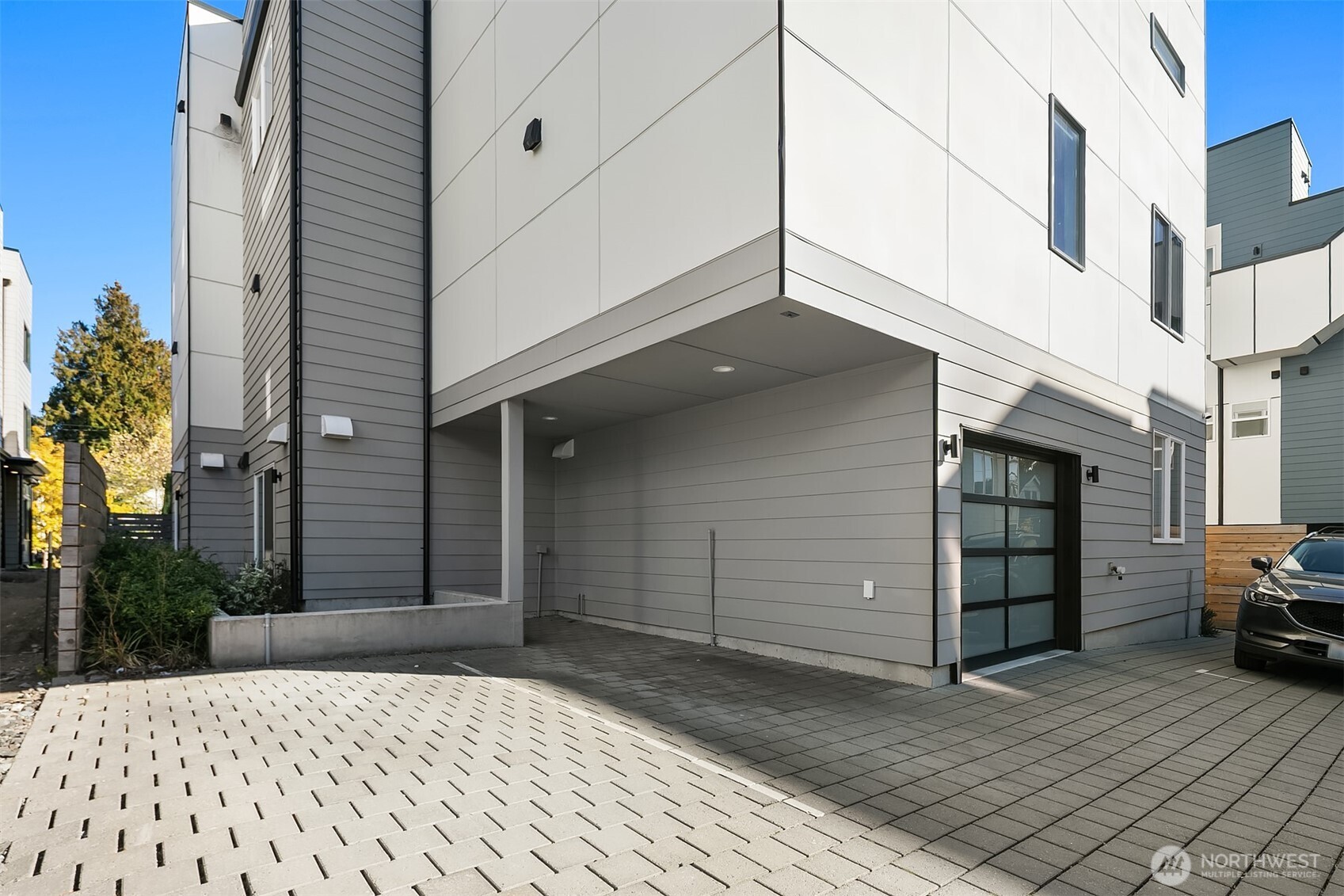8305 12th Avenue Northwest, Unit C Seattle, WA 98117 - Photo 22 of 26 a house view with a outdoor space