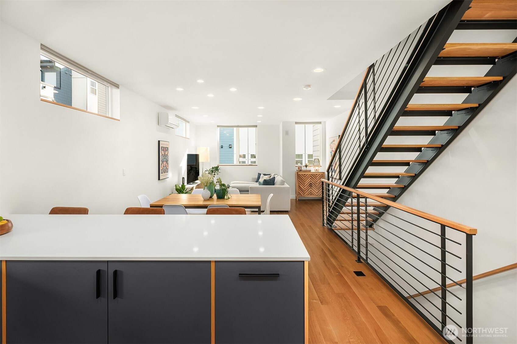 8305 12th Avenue Northwest, Unit C Seattle, WA 98117 - Photo 8 of 26 a view of a kitchen with appliances and cabinets