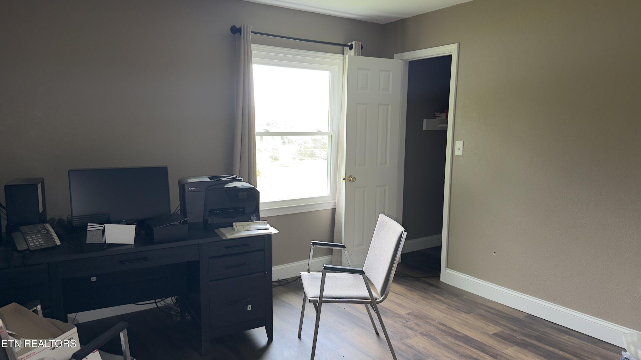 2662 Louisville Road Maryville, TN 37801 - Photo 23 of 60 a view of a workspace with furniture and a window