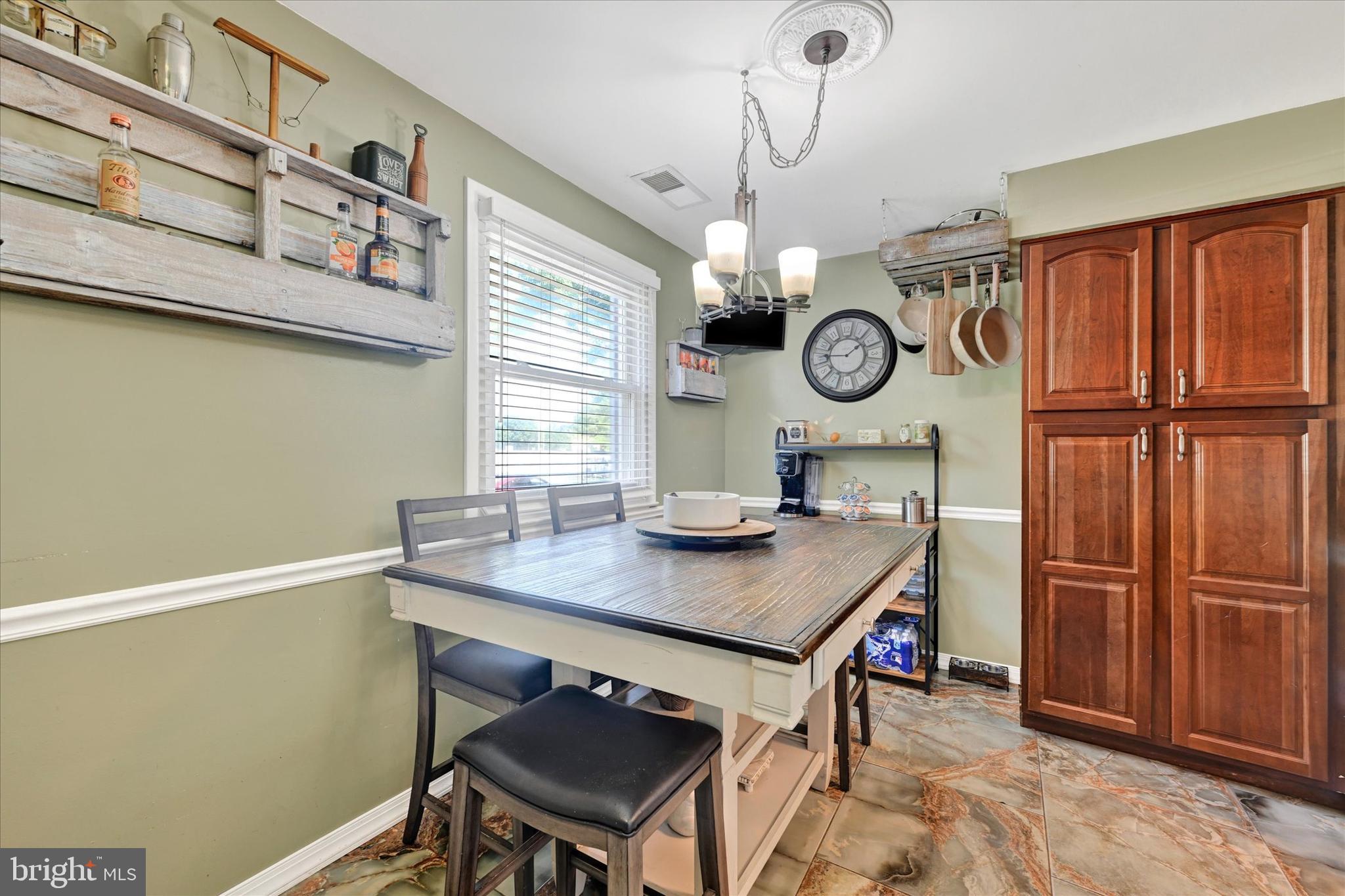 127 Arundel Road Pasadena, MD 21122 - Photo 3 of 31 Dining area with extra cabinetry