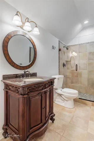 a view of a bathroom with a sink a toilet and a mirror