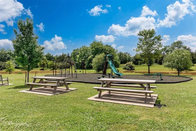 a garden view with a sitting space