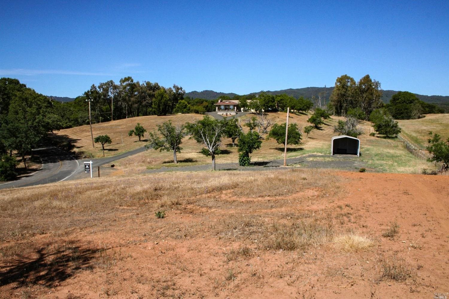 2192 Riggs Road Lakeport, CA 95453 - Photo 1 of 1 a view of a town with big trees
