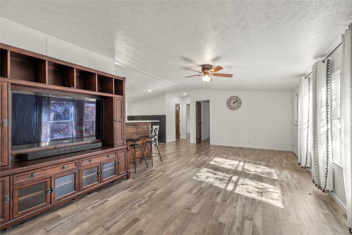 21150 Arnsworth Road Montgomery, TX 77356 - Photo 13 of 35 a view of a livingroom with furniture wooden floor and window