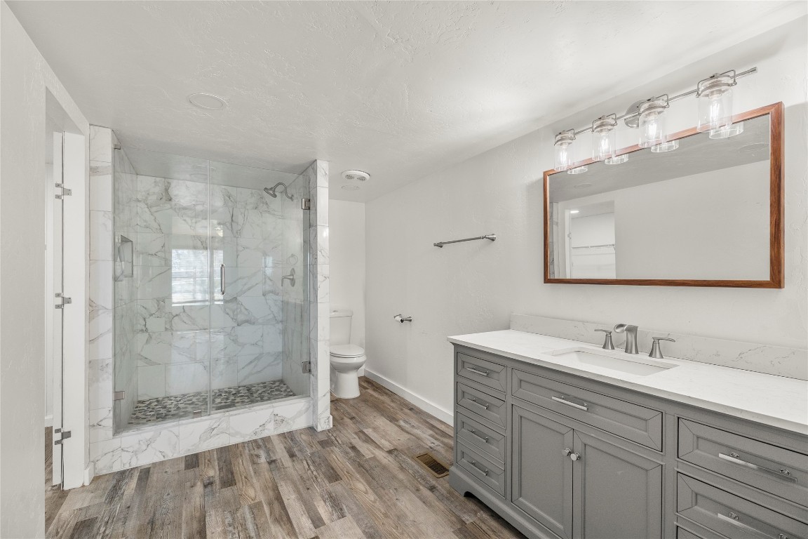 21150 Arnsworth Road Montgomery, TX 77356 - Photo 19 of 35 a bathroom with a shower sink and mirror
