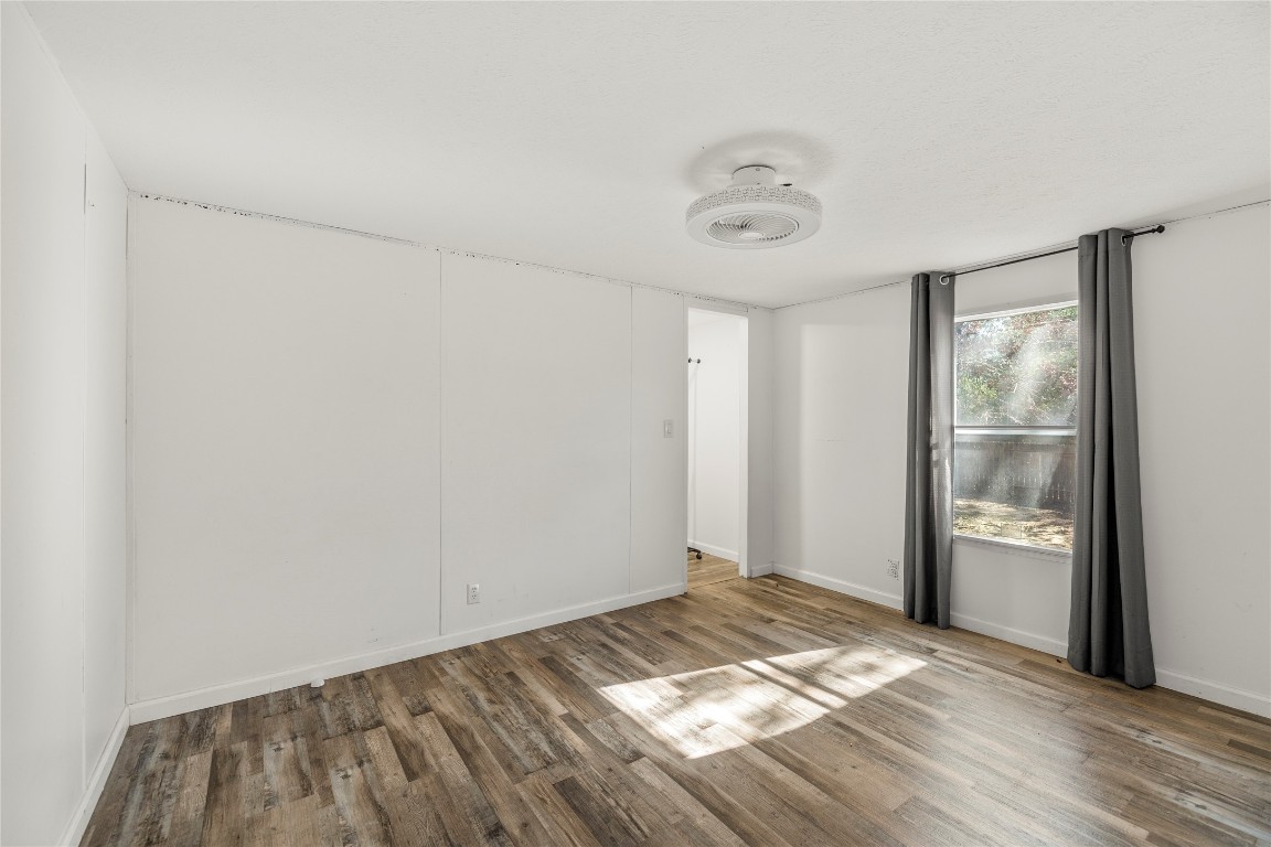 21150 Arnsworth Road Montgomery, TX 77356 - Photo 23 of 35 a view of empty room with wooden floor