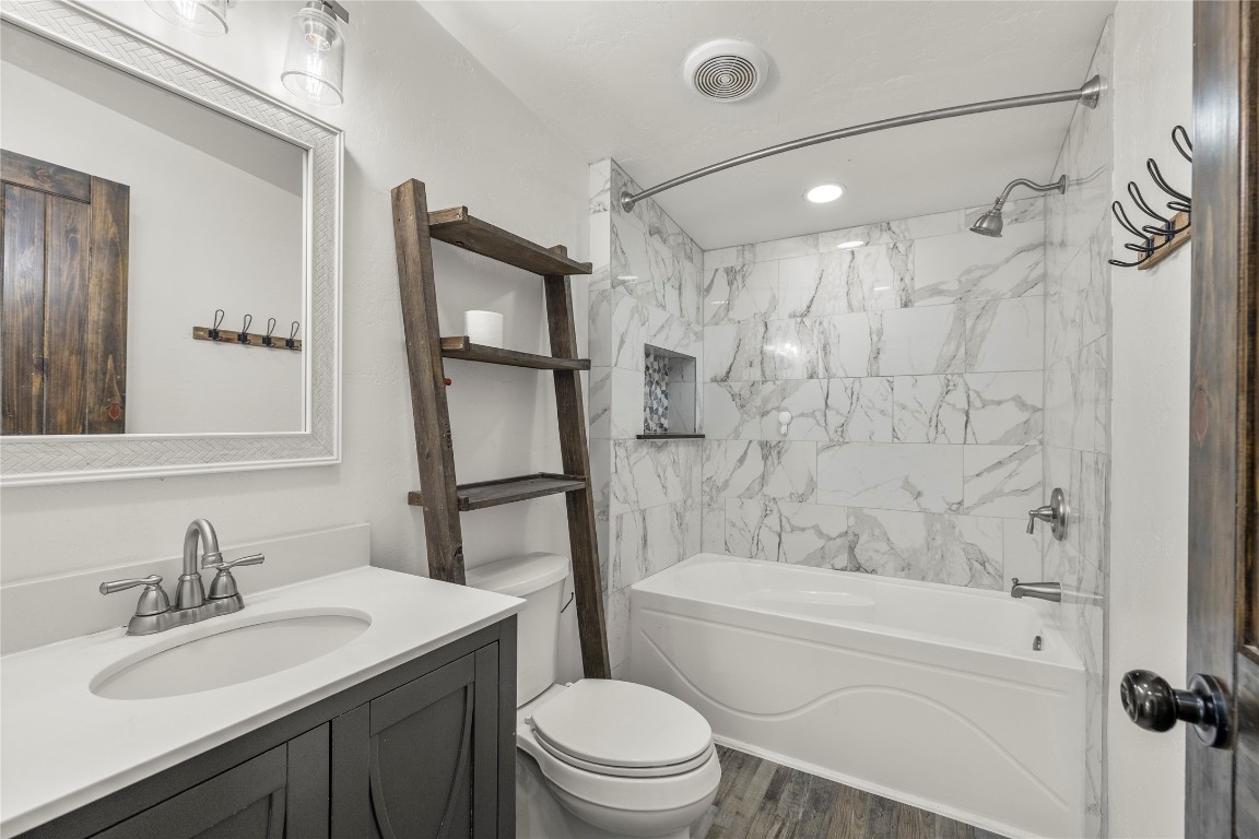 21150 Arnsworth Road Montgomery, TX 77356 - Photo 24 of 35 a bathroom with a sink toilet vanity and shower