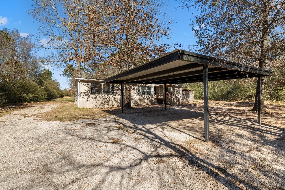 21150 Arnsworth Road Montgomery, TX 77356 - Photo 4 of 35 a view of backyard with a patio and backyard