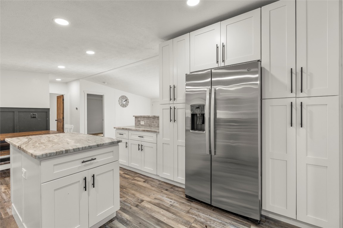 21150 Arnsworth Road Montgomery, TX 77356 - Photo 10 of 35 a kitchen with a refrigerator a sink and dishwasher