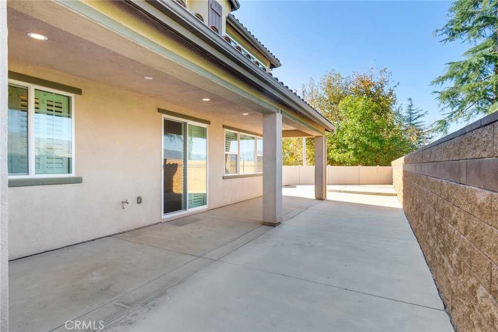 7903 Chaparral Drive Highland, CA 92346 - Photo 28 of 28 a view of an empty room with windows
