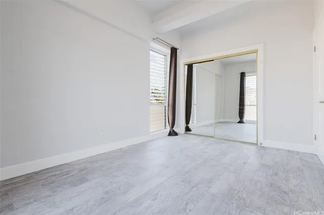 wooden floor and window in a room
