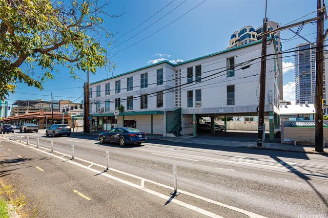 a car parked in front of a building