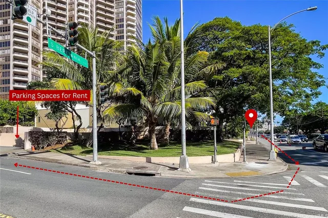 a sign board with buildings in the background