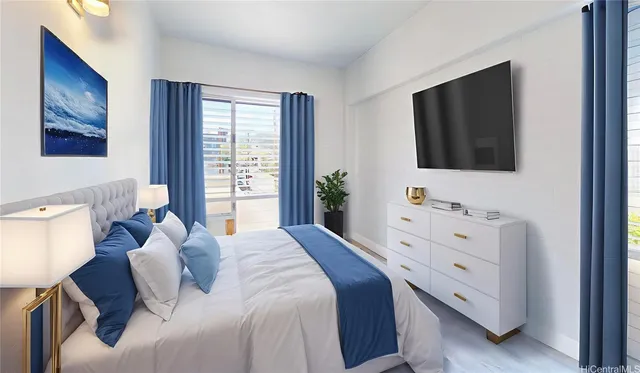 a bedroom with a bed and a flat screen tv