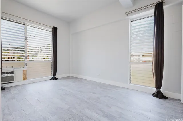 an empty room with windows