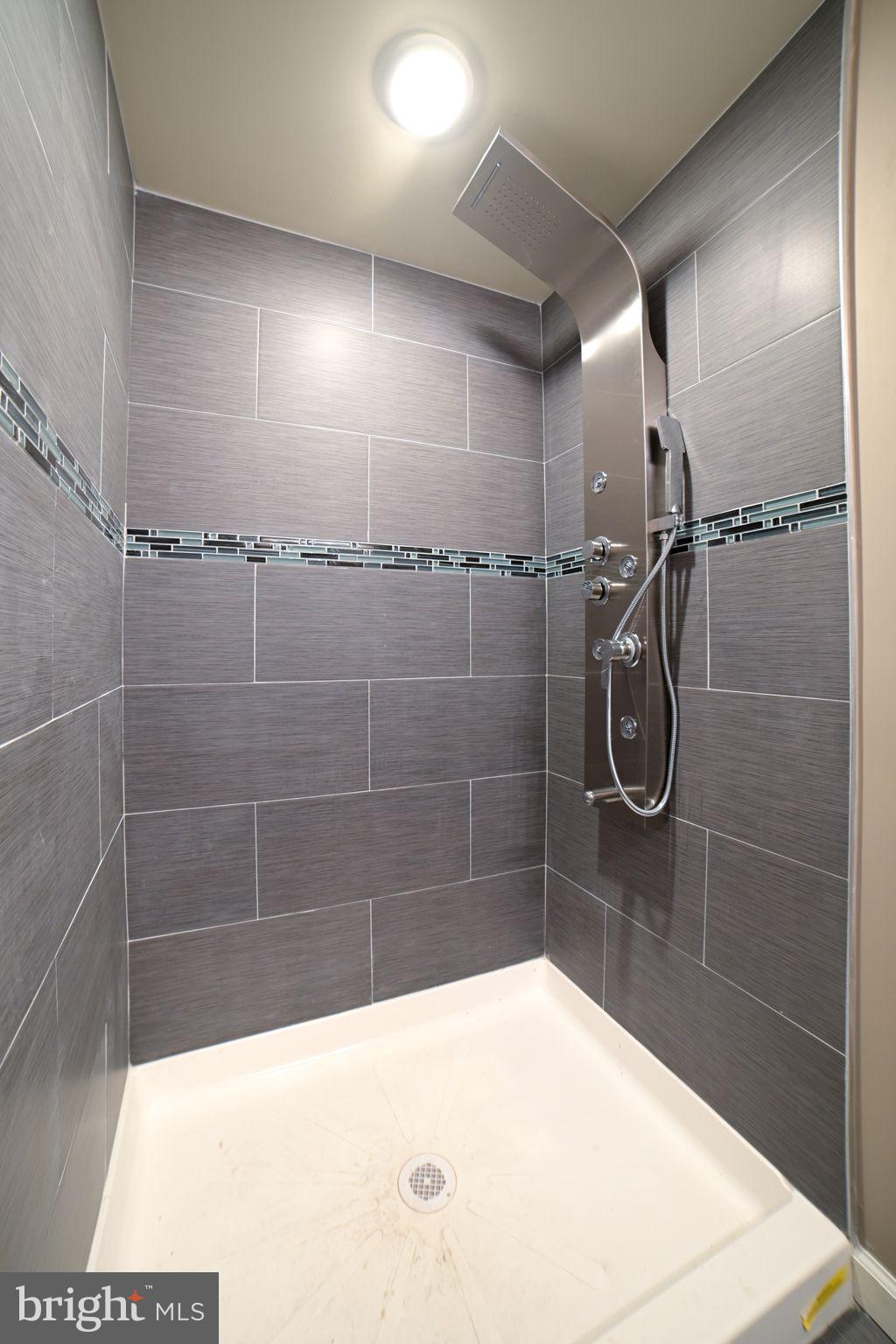 1806 Willington Street, Unit 2 Philadelphia, PA 19121 - Photo 12 of 16 a bathroom with a shower