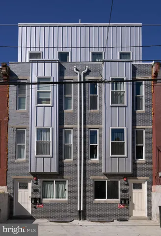 a view of a building with a street