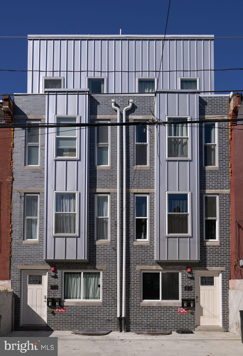 1806 Willington Street, Unit 2 Philadelphia, PA 19121 - Photo 2 of 16 a view of a building with a street