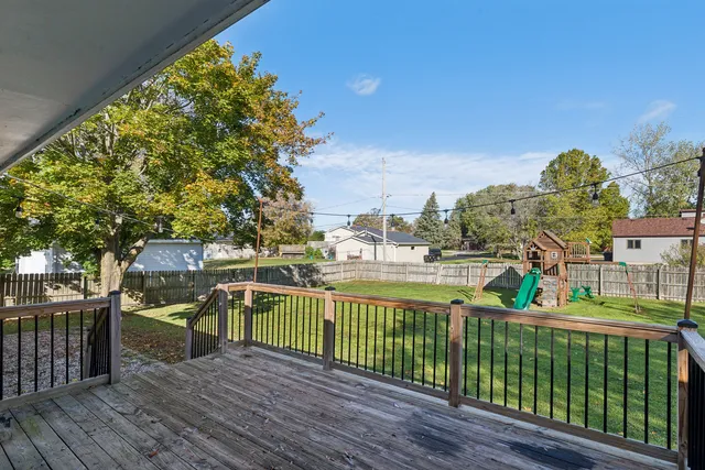 a view of a park with large trees