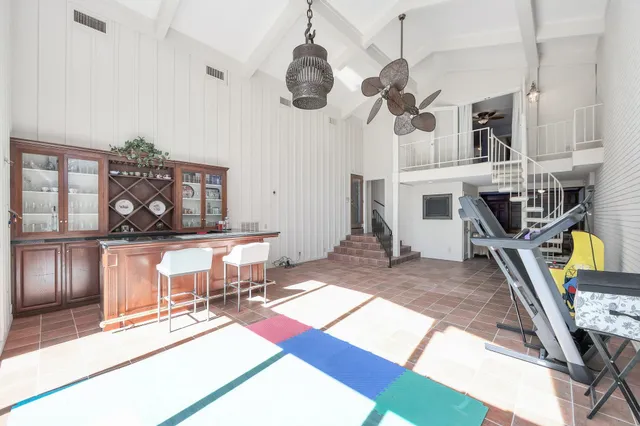 a view of living room kitchen and dining table