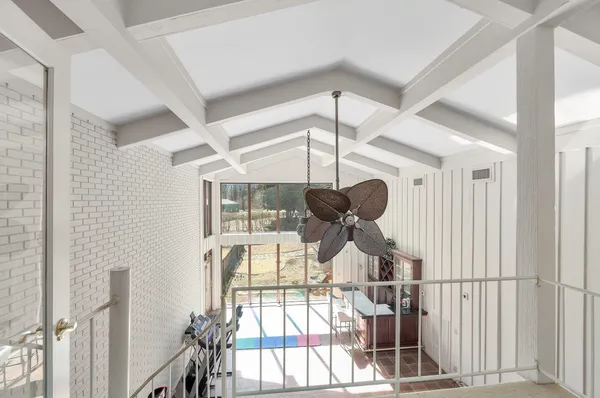 a room with lots of gym equipment
