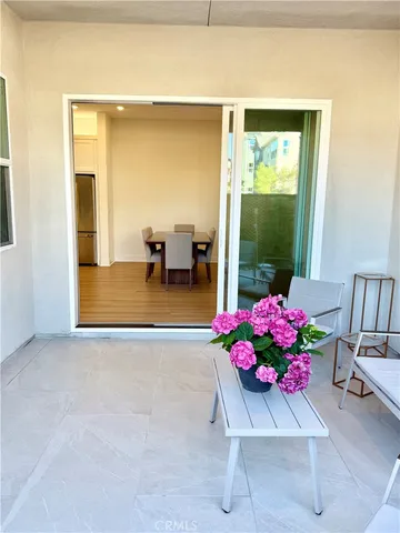 a room with furniture and flowers