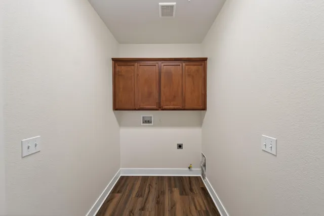 a view of a house with pool and chairs