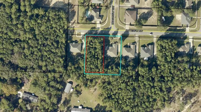 a view of swimming pool with a yard