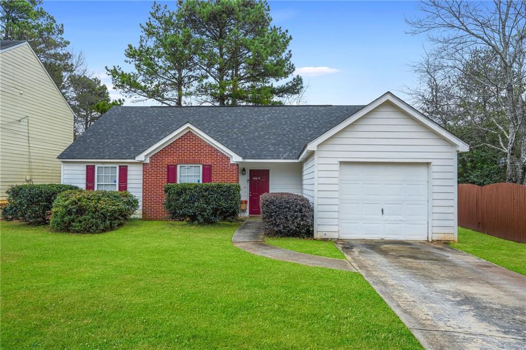 3513 Kingsbrooke Way Decatur, GA 30034 - Photo 1 of 1 a view of a house with a yard and large tree