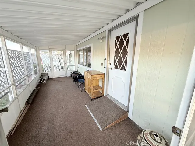 a room with furniture and a window