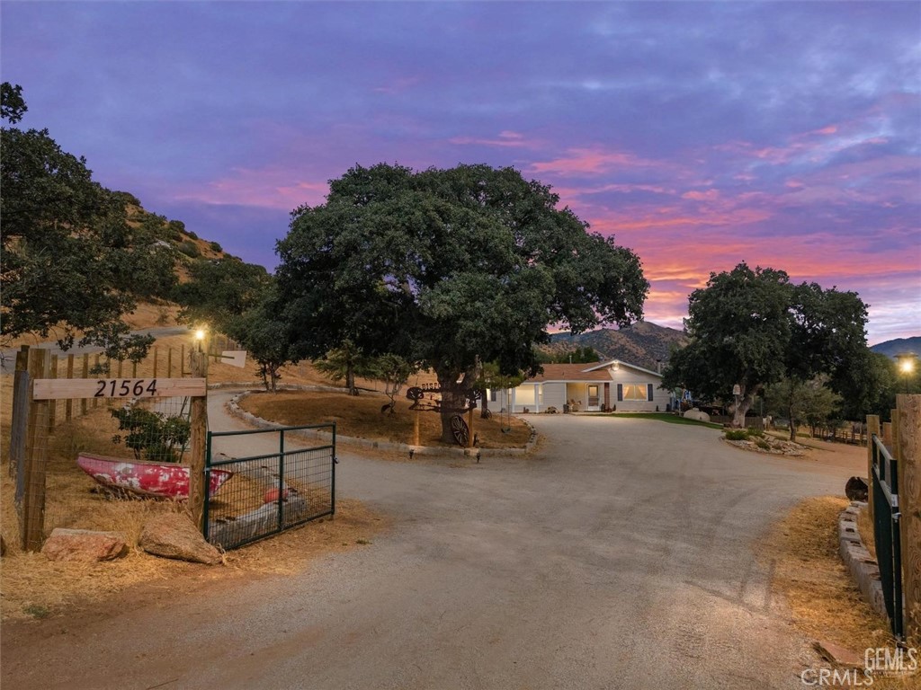 a view of a street with a building in the background