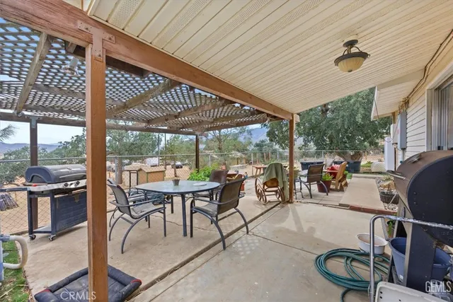 a outdoor living space with furniture and garden view