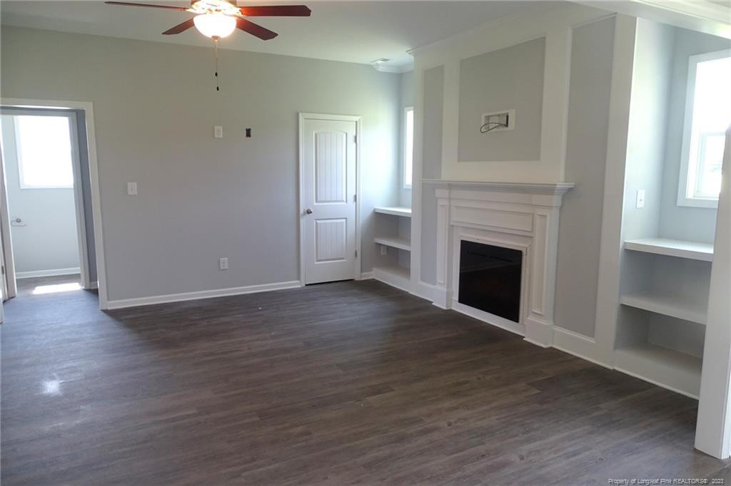 6400 New Hope Church Road Stedman, NC 28391 - Photo 11 of 41 Built-ins around Fireplace