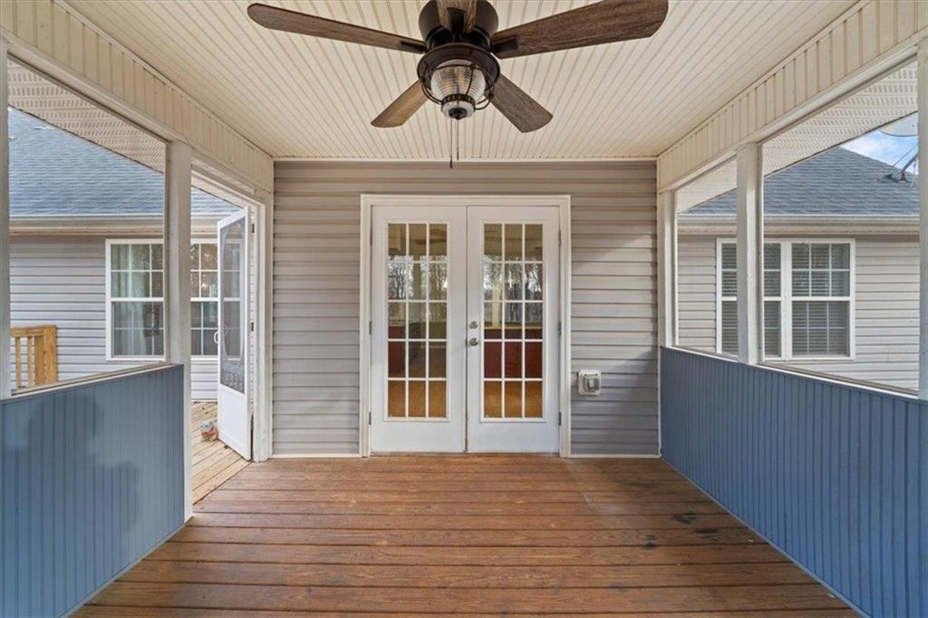 1218 Morgans Run Monroe, GA 30656 - Photo 10 of 39 a view of empty room with wooden floor and fan
