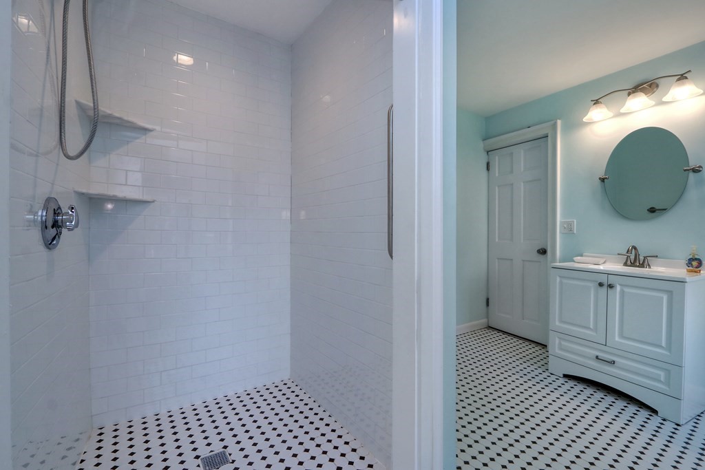 4 Pleasant Street Boston, MA 02129 - Photo 12 of 31 a bathroom with a sink toilet and shower