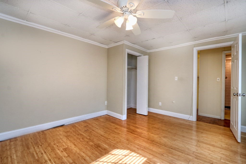 4 Pleasant Street Boston, MA 02129 - Photo 14 of 31 wooden floor in an empty room