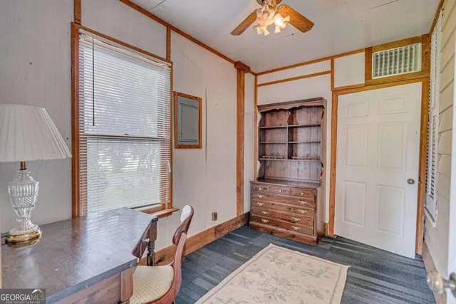 a view of a room with windows