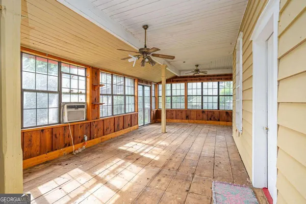 a view of a hallway with a window