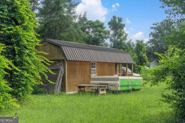 a view of a backyard with a garden