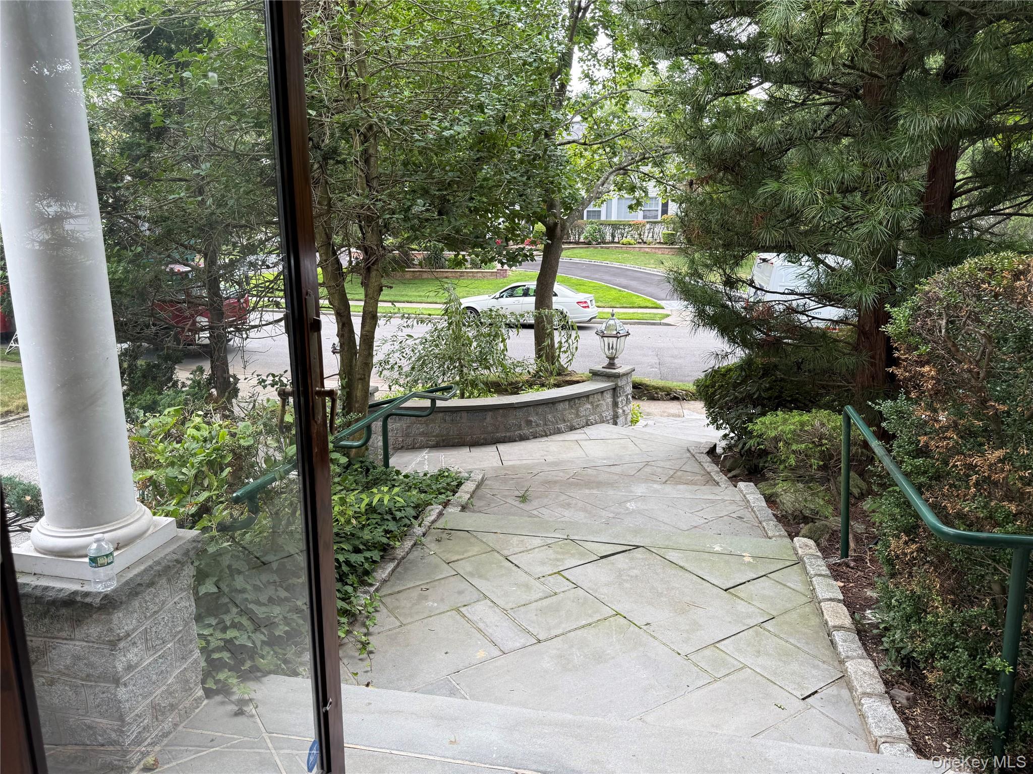 30 Dogwood Road, Unit PVT HOUSE Albertson, NY 11507 - Photo 2 of 15 a view of a pathway with a yard