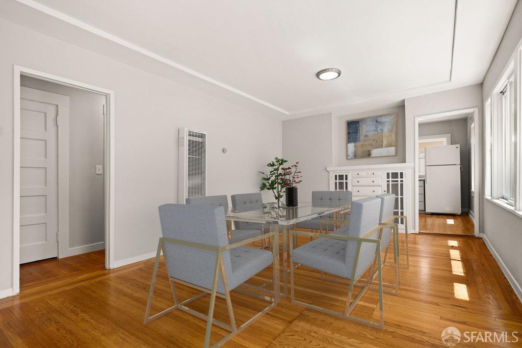 3111 Wheeler Street Berkeley, CA 94705 - Photo 14 of 44 a dining room with furniture and wooden floor