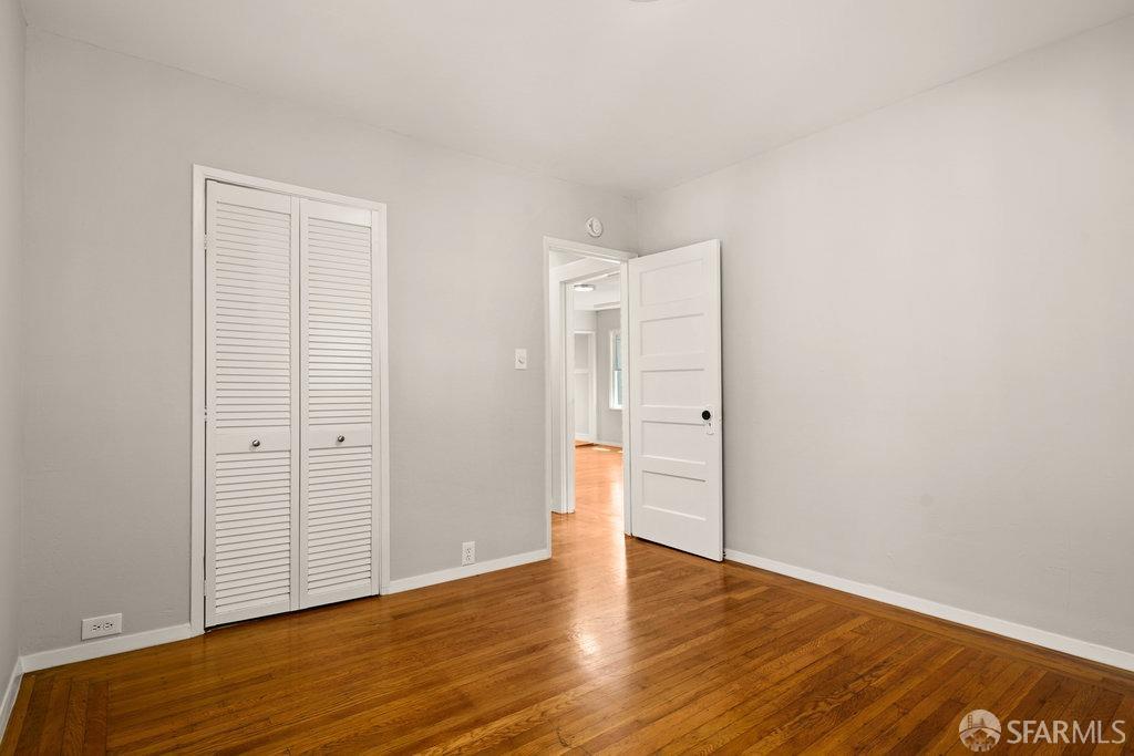 3111 Wheeler Street Berkeley, CA 94705 - Photo 23 of 44 a view of an empty room with wooden floor