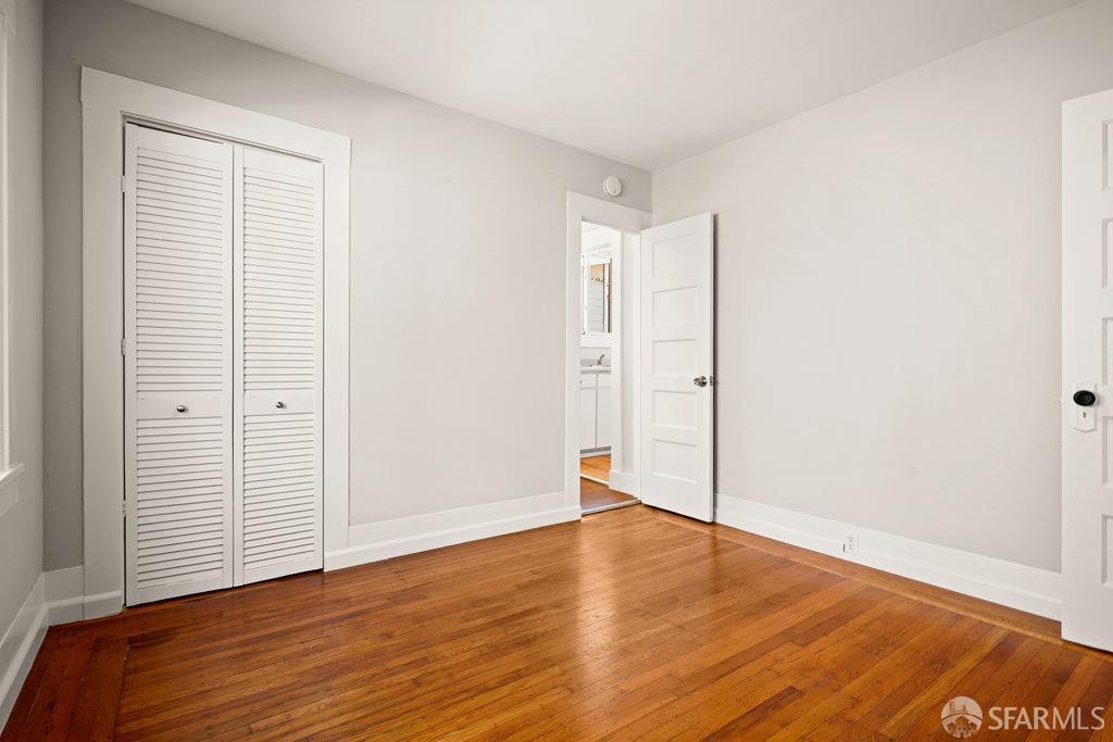 3111 Wheeler Street Berkeley, CA 94705 - Photo 28 of 44 an empty room with wooden floor
