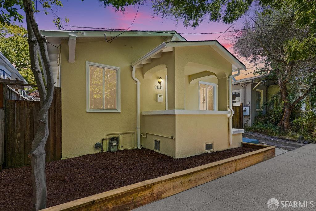 3111 Wheeler Street Berkeley, CA 94705 - Photo 3 of 44 a front view of a house with parking area