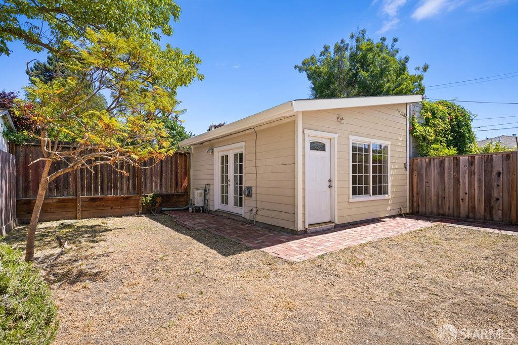 3111 Wheeler Street Berkeley, CA 94705 - Photo 33 of 44 a view of a house with a yard covered with snow in the background
