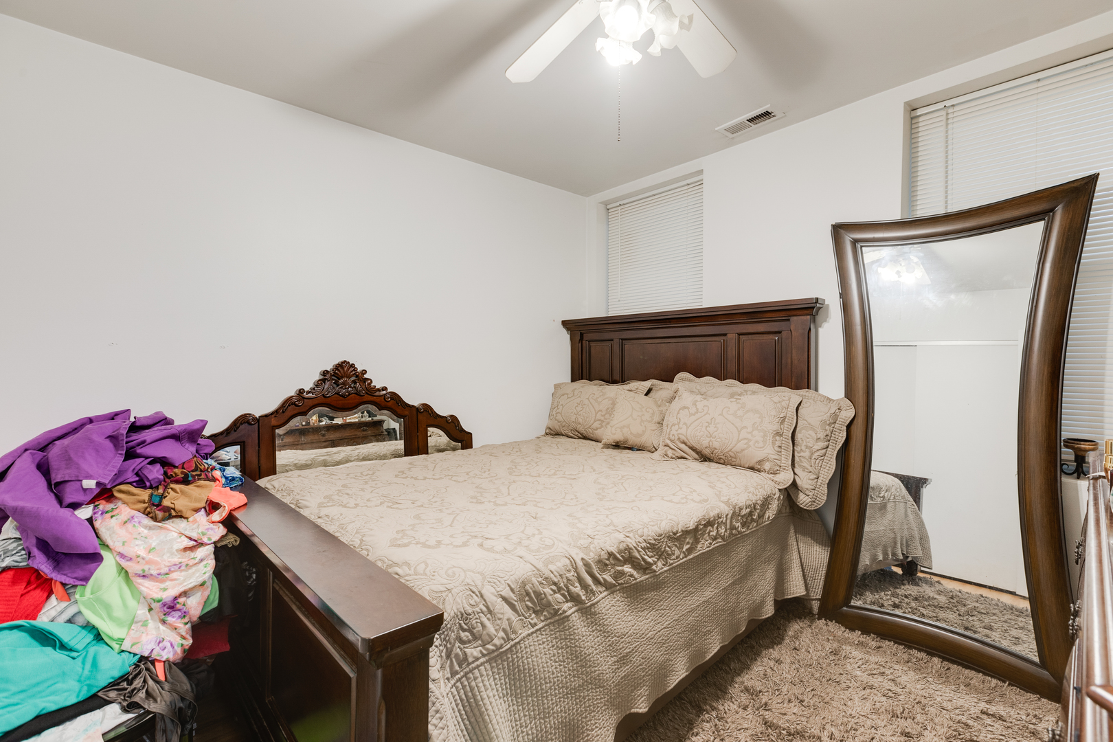 1005 South Racine Avenue Chicago, IL 60607 - Photo 14 of 16 a bedroom with a bed and a dresser