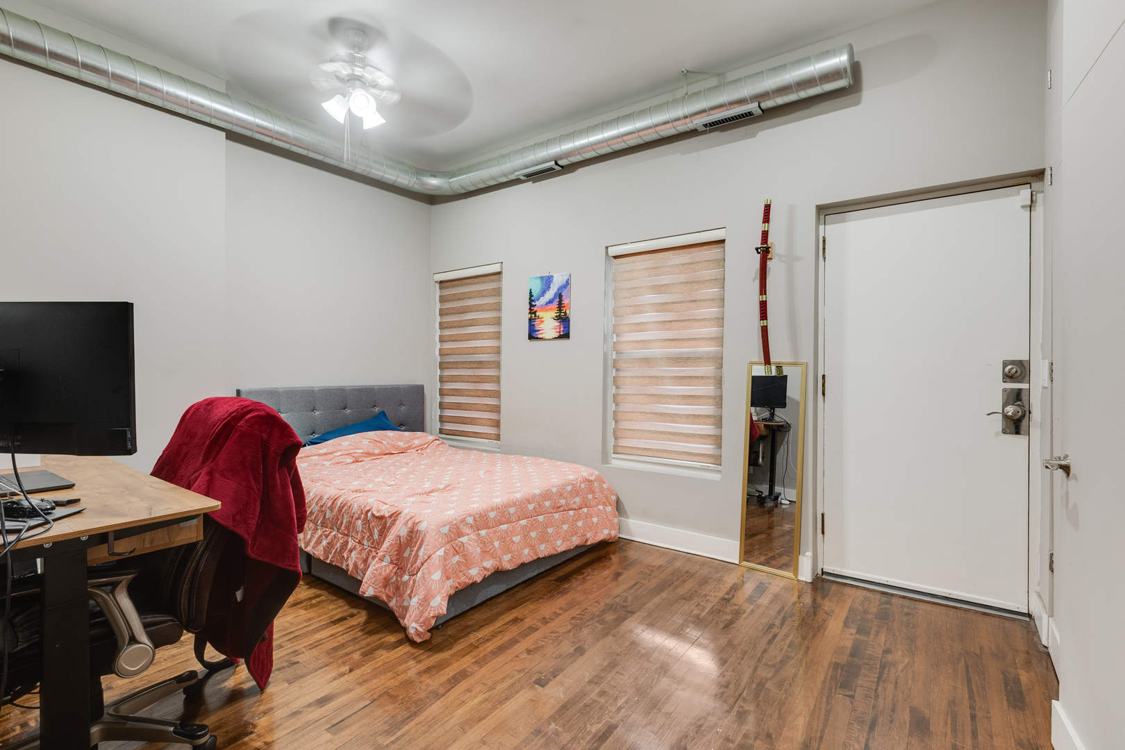 1005 South Racine Avenue Chicago, IL 60607 - Photo 7 of 16 a bedroom with a bed and a desk