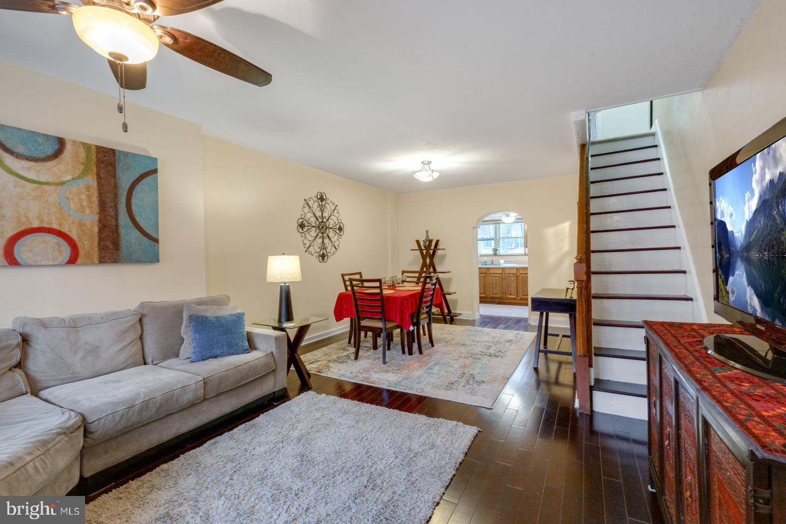 1006 Morris Street Philadelphia, PA 19148 - Photo 1 of 24 a living room with furniture and wooden floor